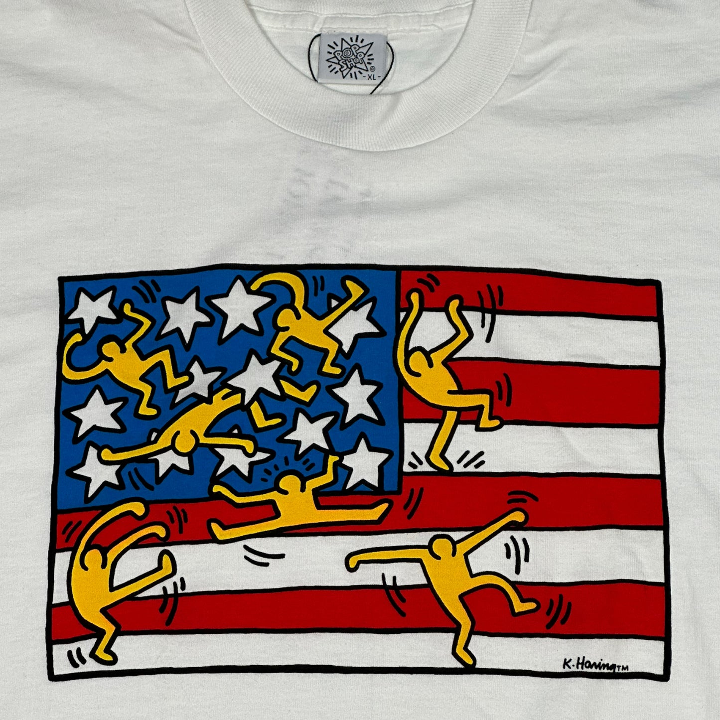 
                  
                    1997 Keith Haring - "American Flag" Tee
                  
                