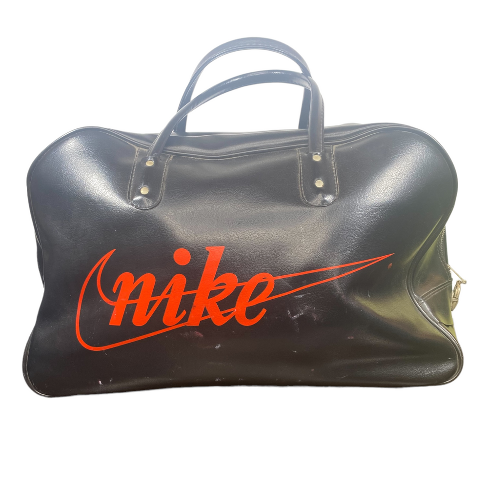 
                  
                    70's Nike Leather Gym Bag With Lock
                  
                