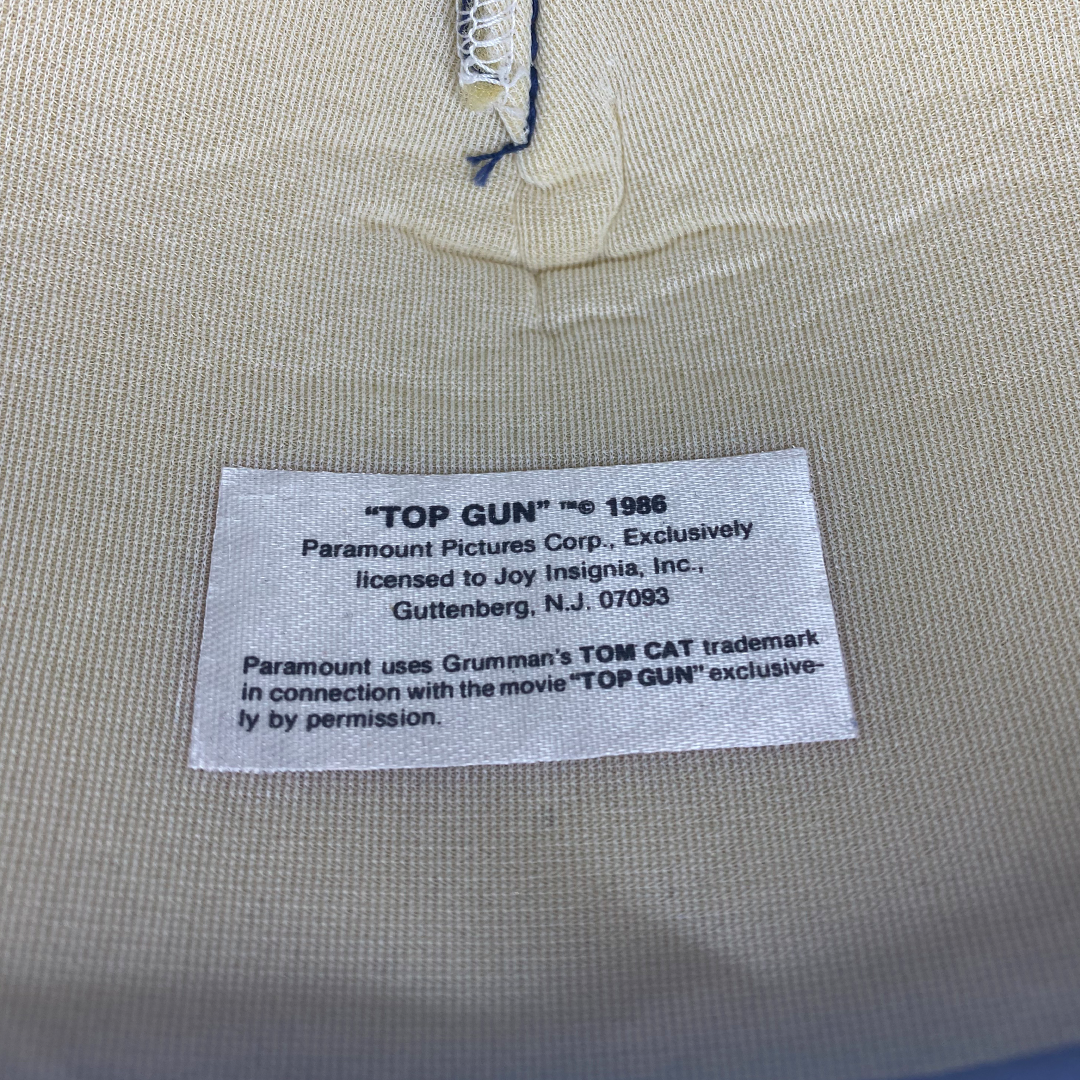 
                  
                    ‘86 Top Gun "Tom Cat" Movie Licensed Trucker Hat *Deadstock*
                  
                